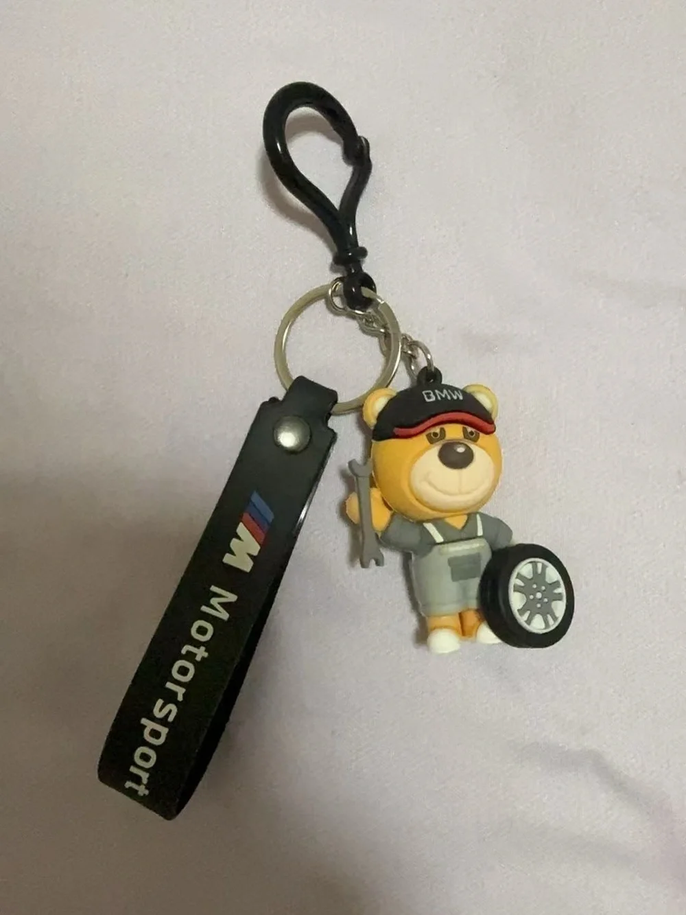 BMW Yellow Bear Mechanic Keychain with Black Strap and Red Cap